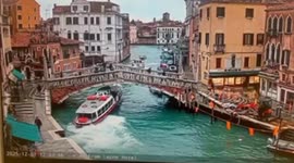 Water bus slams into historic Venice Bridge in near-miss with oncoming vessel