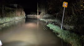 Severe flooding engulfs roads in Devon village as Storm Bram hits the UK