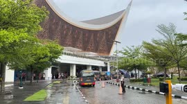Mass burial of victims of landslides and flash floods in Indonesia