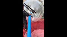 Boy enjoys water ball ride in Shandong, China
