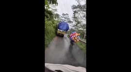 Overloaded Flower-Delivery Truck Overturns on Rural Road in Purbalingga, Indonesia