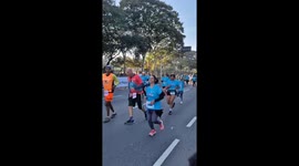 Excited Woman Trips and Loses a Shoe Before Finish Line