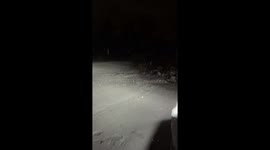 Snow-covered roads during winter storm in Monroe, USA