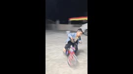 Young boy shows off biking skills in Guangdong, China