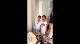 Boy hilariously shakes on vibrating exercise plate in Heilongjiang, China