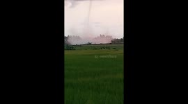 Huge waterspout tornado looms over coastal homes in Indonesia