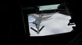 US Air Force fighter jets refuel over the Pacific in training mission