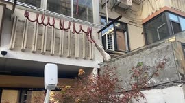 A cat sneaked a bite of the sausage