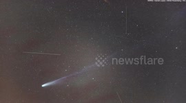 Night sky crowded by satellites