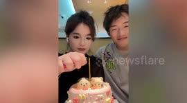 Boyfriend’s hair catches fire while leaning over birthday cake for a kiss