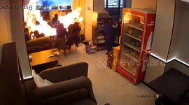 Portable stove explodes, engulfing table in flames as 8 men dine