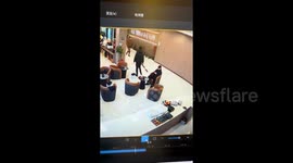 Instant karma! Distracted man staring at woman's behind falls and ends up on guy's lap