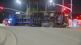 US, Los Angeles: Walnut Semi Truck Overturns Driver Rescued At Intersection