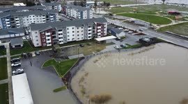 Aerial footage of 100 year flood in Auburn, historical,  record breaking, flood.