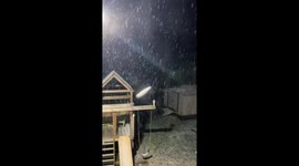 Pouring snow blankets front yard in Weber, Virginia, USA
