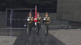 China's national flag flies at half-mast to mourn Nanjing Massacre victims