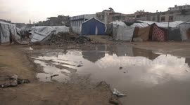 Citizens' tents were drowned by heavy rains after a war