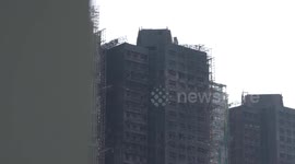 Hong Kong: Taxi feet offers free rides to residents, victims in wake of deadly Hong Kong residential building fire