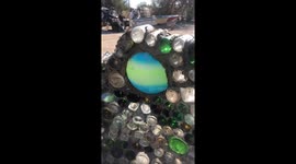 This desert art compound builds walls from bottles and imagination