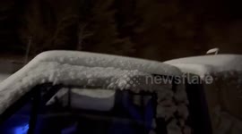 Overnight snowfall covers vehicles in Kentucky, USA