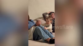 Tot gives sassy side eye while 'intensely' burping new-born brother