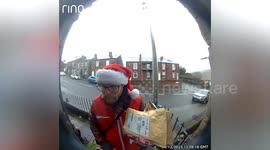 Heart-warming moment 'Britain's best postie' saves the day