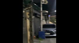 Man lifts entire streetlight pole in Flores, Malabon, Philippines