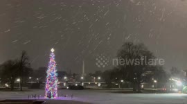 Gentle snowfall covers the National Mall in Washington, D.C., USA
