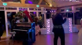 Chris Martin surprises couple by performing wedding first dance