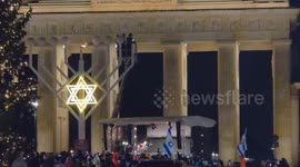 Germany: Pro-Israel Community Gathers at Brandenburg Gate on Hanukkah Following Sydney Attack 2