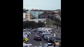 Beachgoers flee during terror attack in Bondi Beach, Sydney, Australia