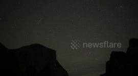 Geminid meteor shower illuminates night sky over Yosemite’s Half Dome