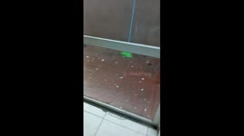 Hail Storm Damages Glass Door