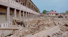 Indonesia flood toll nears 1,000 as debris covers Aceh mosque