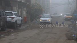 Dense fog disrupts daily life in Baghdad, Iraq