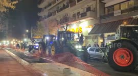 Greek farmers stage protest outside ruling party lawmakers’ offices in Larissa