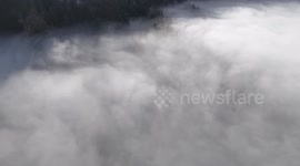 DRONE - Thick winter fog blankets Sarajevo as air pollution soars