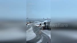 US: JFK Airport Hit By Heavy Snowfall Causing Flight Disruptions