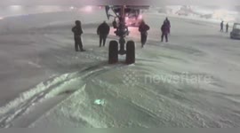 Japan: JAL Flight Towed On Icy Runway At New Chitose Airport