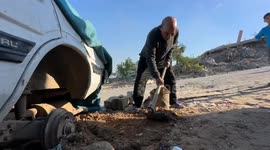 Displaced families return to damaged homes in Gaza as rain floods camps