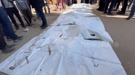 Palestinian Civil Defence Search Bodies