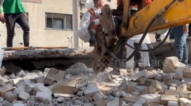 Palestinian Civil Defence Search Bodies