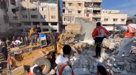 Palestinian Civil Defence Search Bodies