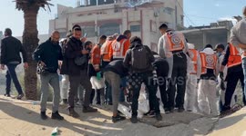 Palestinian Civil Defence Search Bodies