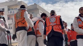 Palestinian Civil Defence Search Bodies