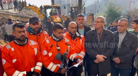 Palestinian Civil Defence Search Bodies