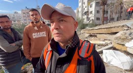 Palestinian Civil Defence Search Bodies