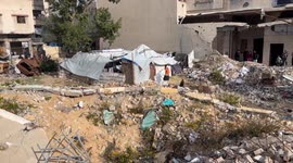 Palestinian Civil Defence Search Bodies