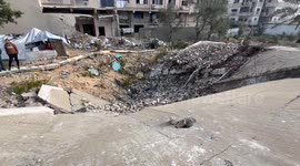 Palestinian Civil Defence Search Bodies