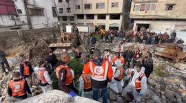 Palestinian Civil Defence Search Bodies